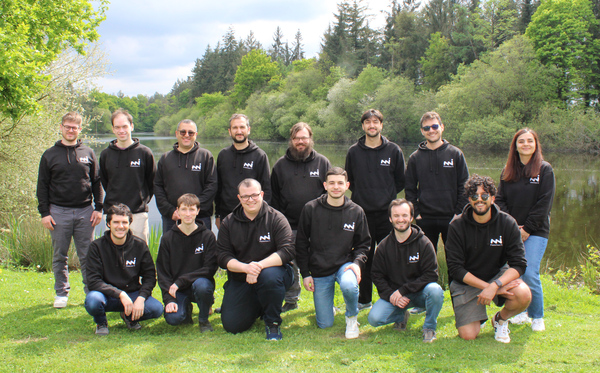 The Functori team outdoors, in Functori hoodies